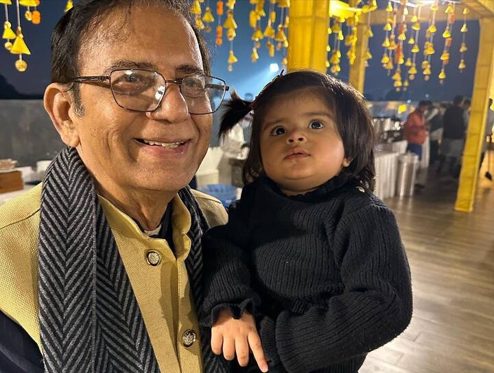 Rajeev and Charu's daughter looks adorable as she posed with her grand father, dressed in all black outfit.