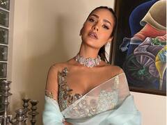 Esha Gupta Photos: ईशा गुप्ता ने शेयर किया रिवीलिंग लुक, एक-एक तस्वीर से नहीं हटेगी आपकी नज़र