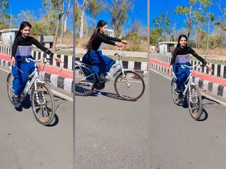 Amazing Video: ਸੜਕ 'ਤੇ ਸਾਈਕਲ ਚਲਾਉਂਦੀ ਕੁੜੀ ਟੱਪਣ ਲਗੀ ਰੱਸੀ, ਬਣਾਇਆ ਕਮਾਲ ਦਾ ਸੰਤੁਲਨ, ਐਕਰੋਬੈਟ ਦੀ ਵੀਡੀਓ ਹੋਈ ਵਾਇਰਲ