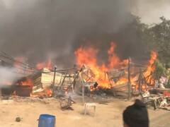 Gurugram Fire: गुरुग्राम में आग लगने से लगातार फट रहे सिलेंडर, 200 झुग्गियां जलकर खाक, देखें तस्वीरें