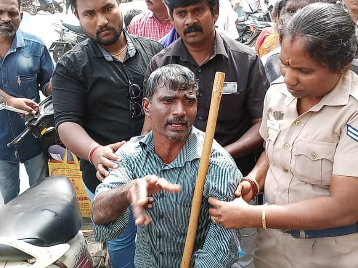 Karur: Attempt to set people with disabilities on fire at People's Grievance Day meeting TNN கரூர்: மக்கள் குறைதீர்க்கும்  நாள் கூட்டத்தில் மாற்றுத்திறனாளி  தீக்குளிக்க முயற்சி