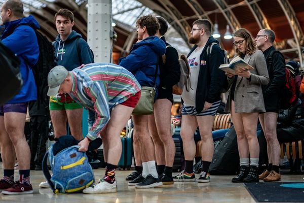 London Underground. London, UK 13 Jan 2019 - Participants take part in 10th  anniversary of 'No Trousers Tube Ride' event by travelling on the District  line of the London Underground without trousers