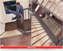 रेलिंग पर सरकते समय नीचे गिरा शख्स, यूजर्स को याद आया अपना बचपन