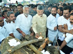 IN PICS: TDP Chief Chandrababu Naidu Burns Copies Of Govt Order Banning Public Meetings On Roads