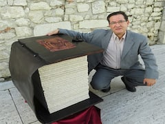 Man Creates World Record For Writing 81 Books Backward Using 'Mirror Writing' Technique