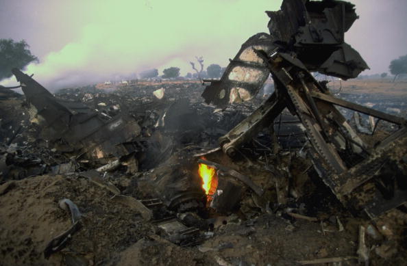 Smoldering wreckage the morning after Saudi Arabian Airlines Boeing 747 passenger jet and Kazakhstan KazAir Ilyushin-76 cargo planes collided in midair in crash killing all 349 aboard planes. (GettyImages)