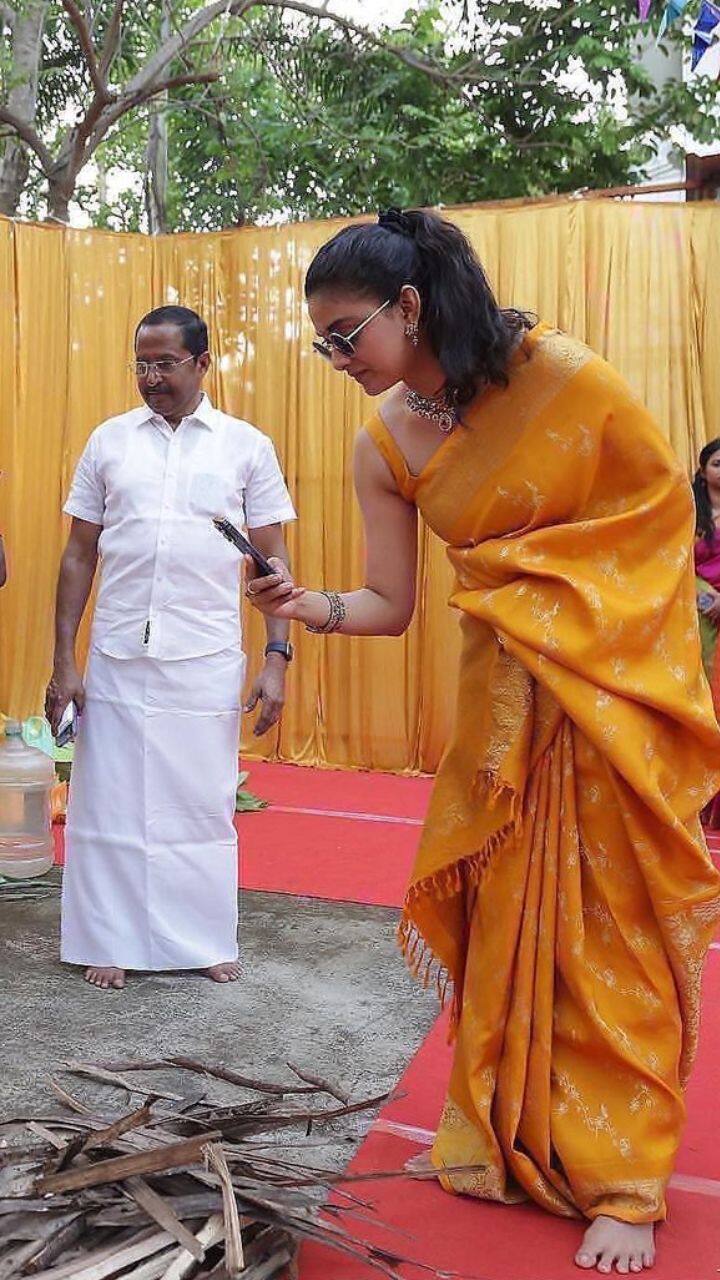 பொங்கல் வைப்பதை புகைப்படம் எடுக்கிறார்