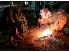 ठाण्यात थंडीचा पारा वाढल्याने दिवसभर हवेत गारठ; नागरिकांनी घेतला शेकोटीचा आसरा