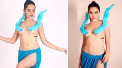 Urfi Javed video : ન તો ટોપ, ન બ્રા, માત્ર વાદળી પીંછાથી ઢાંક્યું શરીર, જુઓ ફોટા