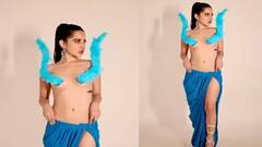 Urfi Javed video : ન તો ટોપ, ન બ્રા, માત્ર વાદળી પીંછાથી ઢાંક્યું શરીર, જુઓ ફોટા