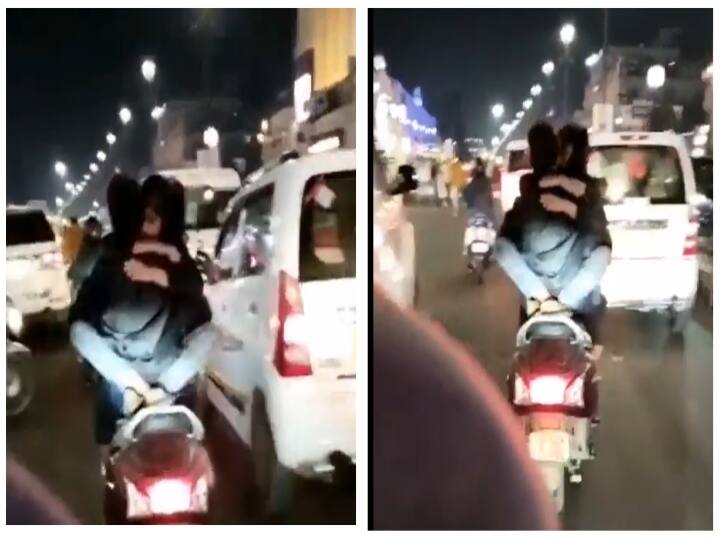 Couple hug on moving scooter on busy street in uttarpradesh Lucknow watch video Watch Video: 'கட்டிப்பிடி.. கட்டிப்பிடிடா..' பரபரப்பான சாலை.. ஓடும் ஸ்கூட்டியில் ரொமான்ஸ் செய்த காதலர்கள்..! வைரலாகும் வீடியோ..!