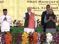PM Modi Inaugurates Several Project, Distributes Title Deeds To Beneficiaries In Karnataka - SEE PICS