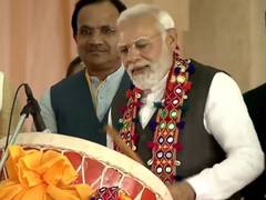 PM Modi Inaugurates Several Project, Distributes Title Deeds To Beneficiaries In Karnataka - SEE PICS