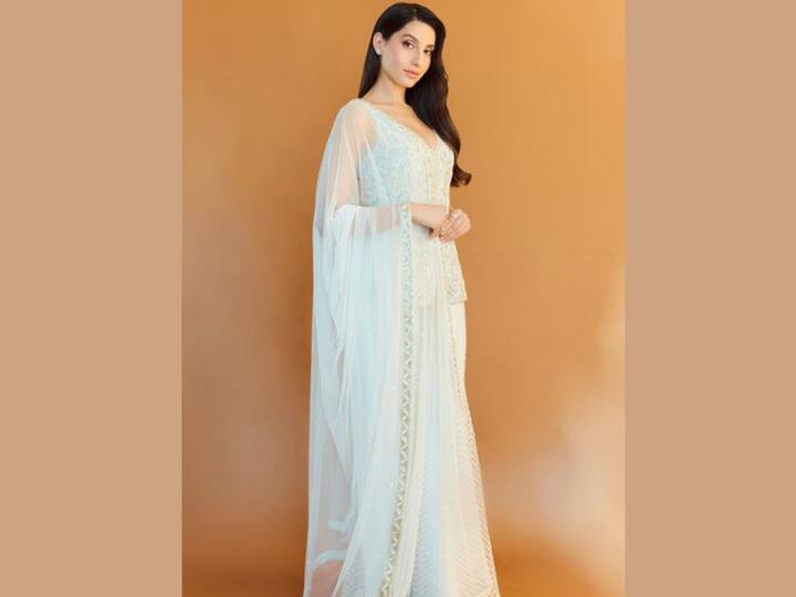 She wore a white suit with all-over embroidery, which included a kurta, skirt, and a chiffon dupatta from the shelves of fashion designer Ritika Mirchandani. (Image Source: Instagram)