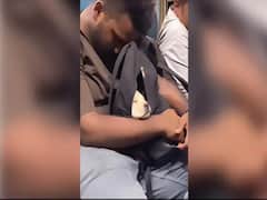 Man Carrying Puppy In His Backpack During Train Journey Will Melt Your Heart: WATCH