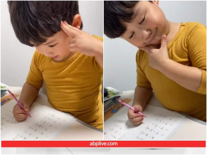 video of a small child solving math problems in a surprising way see video Video: छोटे से बच्चे ने अनोखे अंदाज में हल किए गणित के सवाल, टैलेंट के कायल हुए यूजर्स