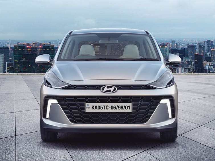 2023 Hyundai Aura facelift launched at Rs. 6.30 lakh Price features other details are here Latest Auto News in Marathi 2023 Hyundai Aura Facelift: 30 पेक्षा जास्त सेफ्टी फीचर्ससह Hyundai Aura लॉन्च, किंमत 6.30 लाख रुपये