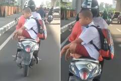 Viral Video: ਬੇਟੇ ਨੂੰ ਸਕੂਟੀ 'ਤੇ ਸਕੂਲ ਲੈ ਕੇ ਜਾਂਦੀ ਨਜ਼ਰ ਆਈ ਮਾਂ, ਬੱਚੇ ਦੇ ਅੰਦਾਜ਼ ਨੇ ਜਿੱਤ ਲਿਆ ਦਿਲ