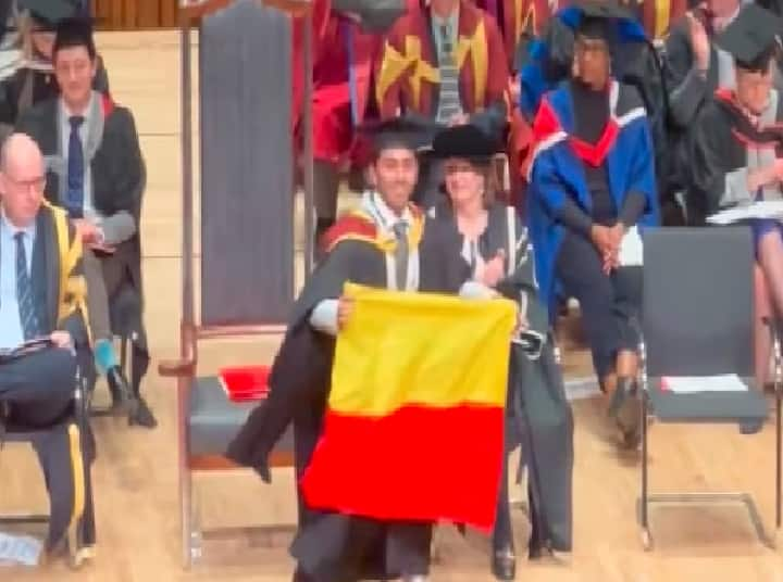 Indian student unfurls Karnataka flag at graduation ceremony in London, Twitter users react லண்டன் பட்டமளிப்பு விழாவில் கர்நாடக மாநில கொடி: மாணவர் செயலுக்கு நெட்டிசன்கள் ரியாக்‌ஷன்