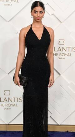 दुबई में अटलांटिस द रॉयल होटल की ग्रैंड ओपनिंग में ब्लैक गाउन में बेहद ग्लैमरस लगीं Suhana Khan, हॉल्टर ड्रेस में दिए किलर पोज