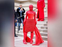 Paris Fashion Week: Doja Cat Breaks Barriers By Embracing Mixture Of Art And Fashion In Her Red Ensemble