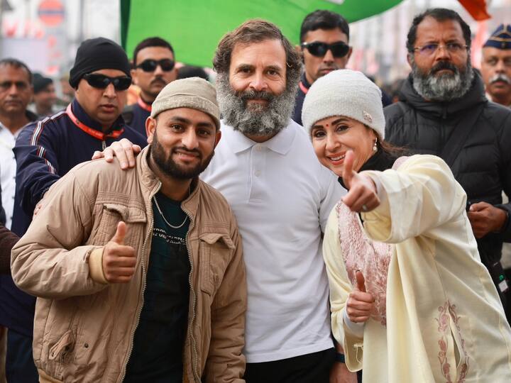 Dressed in a cream-coloured traditional Kashmir Pheran and beanie cap, Urmila Matondkar was interacting with Rahul Gandhi as they marched along.