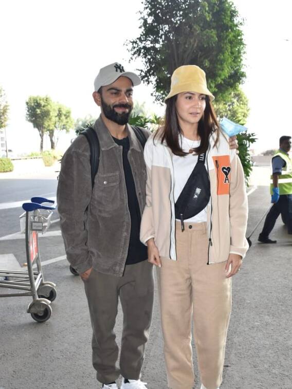 மும்பை விமான நிலையத்தில் விராட்-அனுஷ்கா!