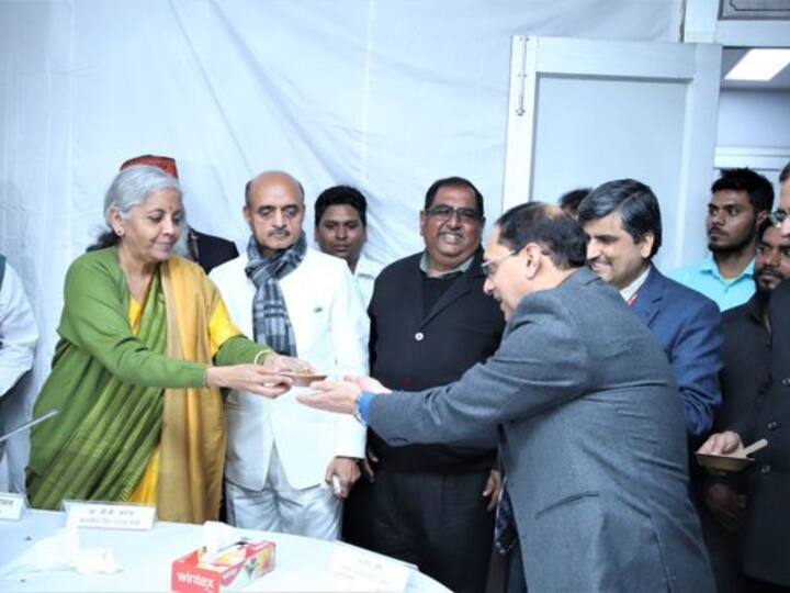 The tradition involves preparing the sweet dish in a big 'kadhai' (frying pot) and serving it to finance ministry officials directly associated with the budget-making process, to acknowledge their efforts. [Image Credit: Twitter/Ministry of Finance]