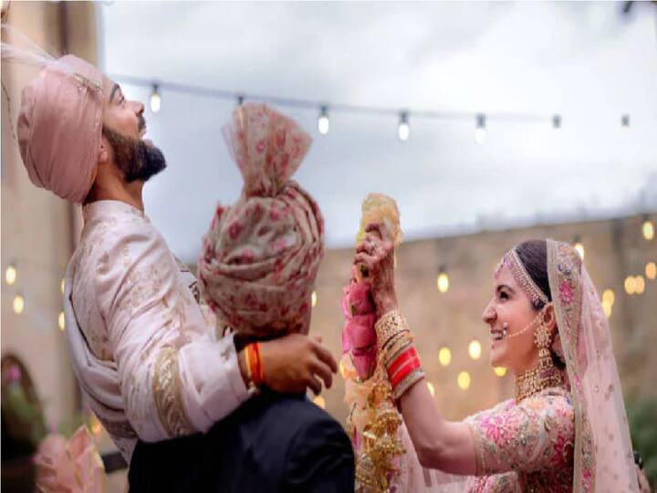 Anushka Sharma: Anushka chose a pale pink lehenga with renaissance embroidery in vintage English colours embellished with silver-gold metal thread, pearls, and beads for her wedding dress. (Image Source: Instagram)