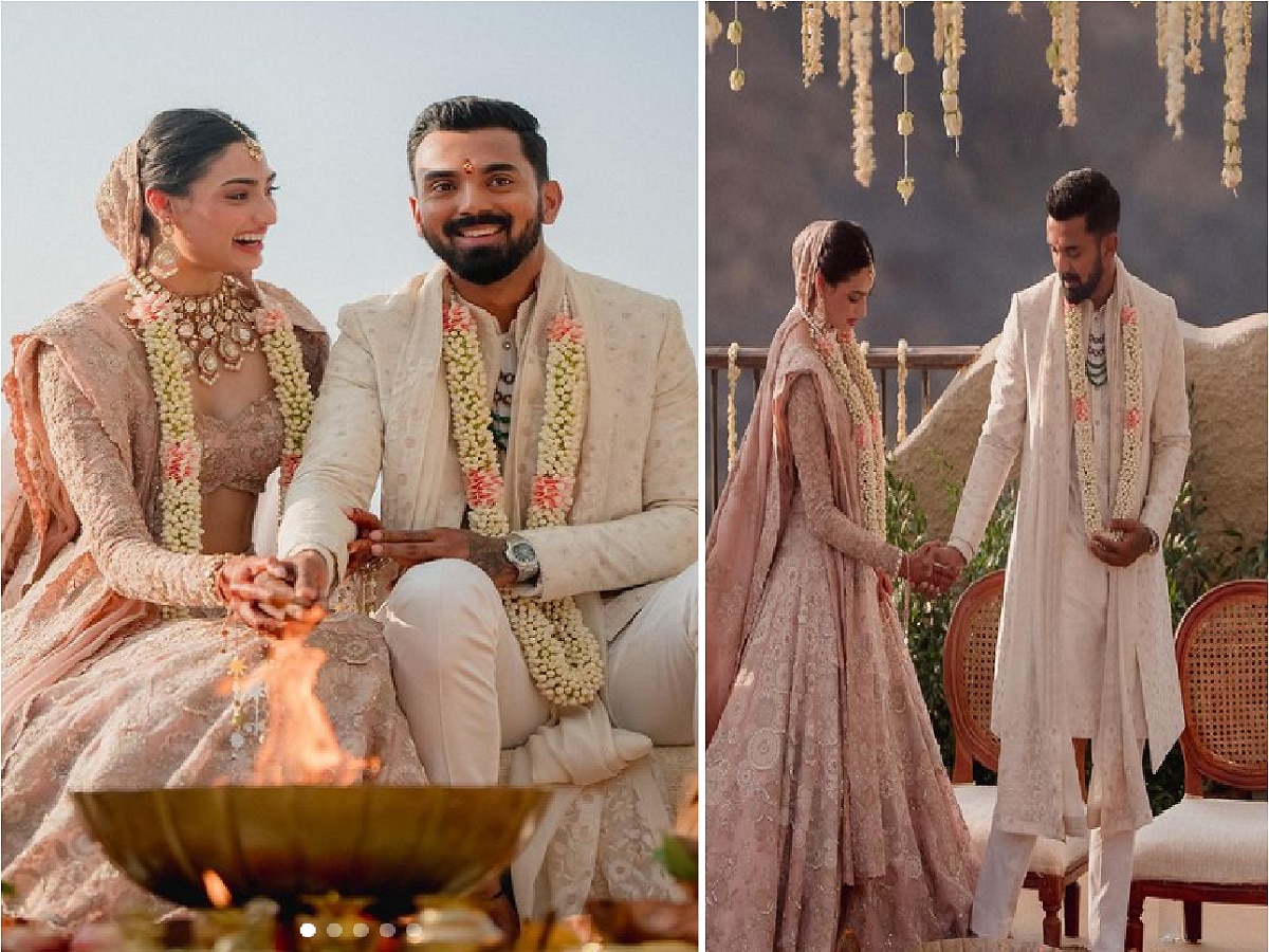 AI generated Indian groom dressed in white Sherwani and red hat with  stunning bride in red lehenga stand and hold each hands walking outside  34797752 Stock Photo at Vecteezy