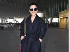 Rashmika Mandanna Pics: लॉन्ग लाइन ओवरकोट और स्लीपर में एयरपोर्ट पर स्पॉट हुईं रश्मिका मंदाना, लेटेस्ट तस्वीरों में देखें एक्ट्रेस का ये लुक