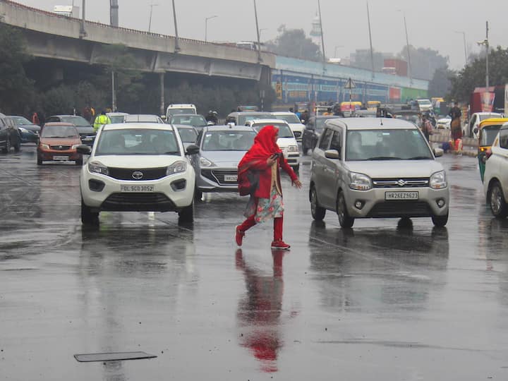 Gurugram also braved rains today. The weatherman has predicted generally cloudy skies with light rain and thundershowers during the morning for Monday, adding that the minimum and maximum temperatures are likely to hover around 10 and 20 degrees Celsius, respectively. (Image Source: PTI)