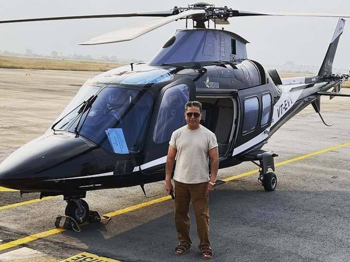 Kamal Haasan commuting to his upcoming film Indian 2 sets in a chopper daily Watch video here Indian 2: भौकाल हो तो ऐसा! 'इंडियन 2' के सेट पर हर दिन हेलीकॉप्टर से पहुंच रहे कमल हासन, सामने आया वीडियो