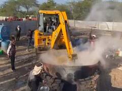 In Pics: શું તમે JCB મશીનથી ભોજન તૈયાર થતાં જોયું છે? આ તસવીરો જોઈને તમે પણ દંગ રહી જશો