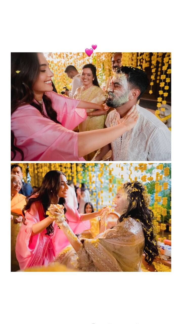 In one of the pictures, Tania can be seen applying haldi on the bride and the groom as she looks gorgeous decked up in a baby pink suit.
