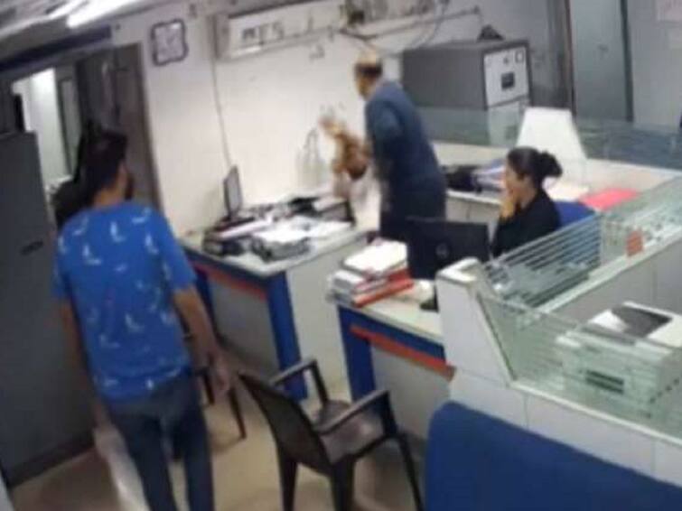 Gujarat Caught On Camera Two men thrash Bank of India employee Nadiad bank loan issue BOI viral video social media Caught On Camera: Bank of India Employees In Gujarat Thrashed For Asking Papers To Clear House Loan, 2 Arrested
