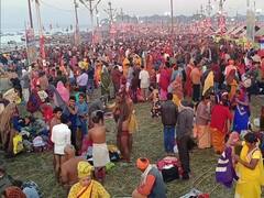 In Pics: तस्वीरों में दिखें, माघ पूर्णिमा पर प्रयागराज के संगम तट पर उमड़े श्रद्धालु, विदेशी पर्यटक भी दिखे भक्ती में लीन