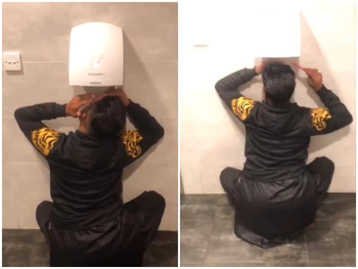 Man using hand dryer as hair dryer in Washroom funny Desi Jugaad Viral video Jugaad Video: वाशरूम में लगी थी हाथ सुखाने की मशीन, फिर एक बंदे ने लगाया ऐसा खुराफाती दिमाग कि हक्के-बक्के रह गए लोग