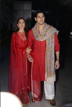 Newlyweds Sid-Kiara Twin In Red For Grih Pravesh, Distribute Sweets To Paps At Delhi Airport. See Pics