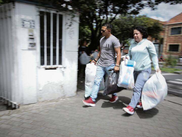 People organize packages at the Turkish Cooperation and Coordination Agency - TIKA to send for the victims of the devastating earthquakes in Turkiye as part of an aid campaign in Bogota, Colombia. (Image Source: Getty)