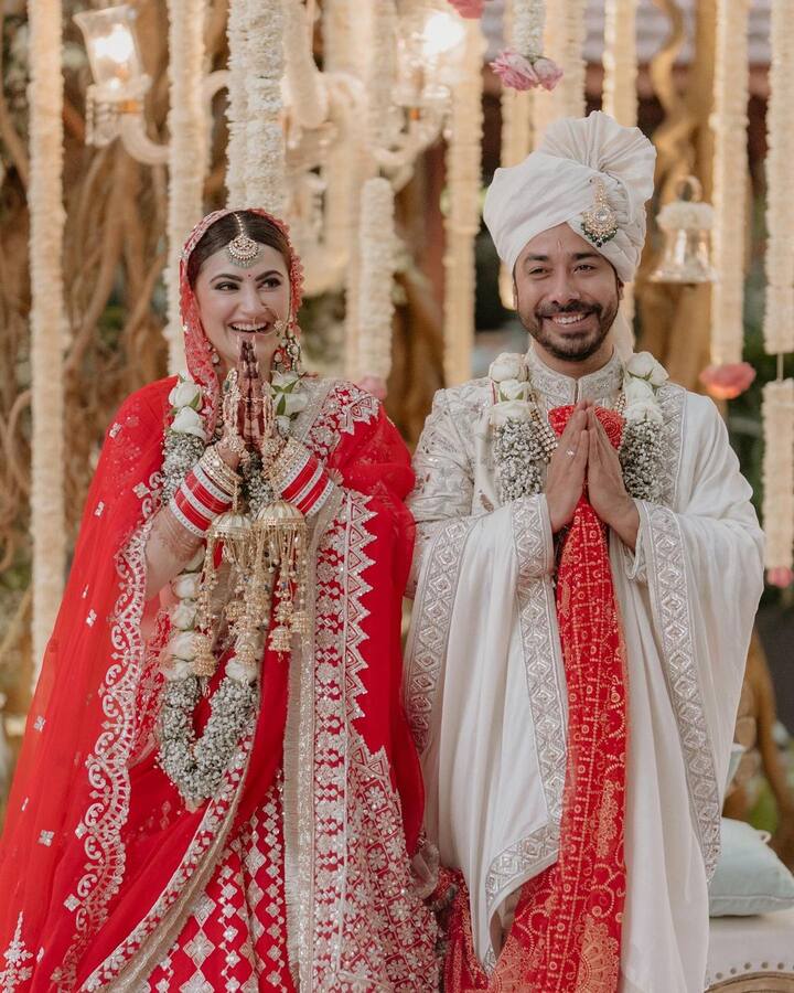 Shivaleeka accessorised her all-red lehenga with Polki diamond jewellery and understated makeup. Her lehenga had silver gota-patti work as well as two veils. (Image Source: Instagram)