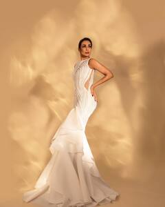 Malaika Arora Photos: व्हाइट गाउन में बेहद ग्लैमरस लगीं मलाइका अरोड़ा, कैमरे के सामने हर पोज में ढाया कहर