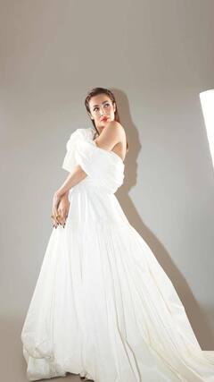 Photo : व्हाइट गाऊनमध्ये मलायकाचा ग्लॅमरस लूक