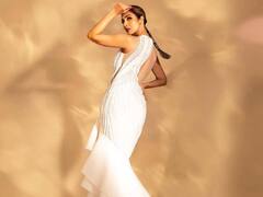 Malaika Arora Photos: व्हाइट गाउन में बेहद ग्लैमरस लगीं मलाइका अरोड़ा, कैमरे के सामने हर पोज में ढाया कहर