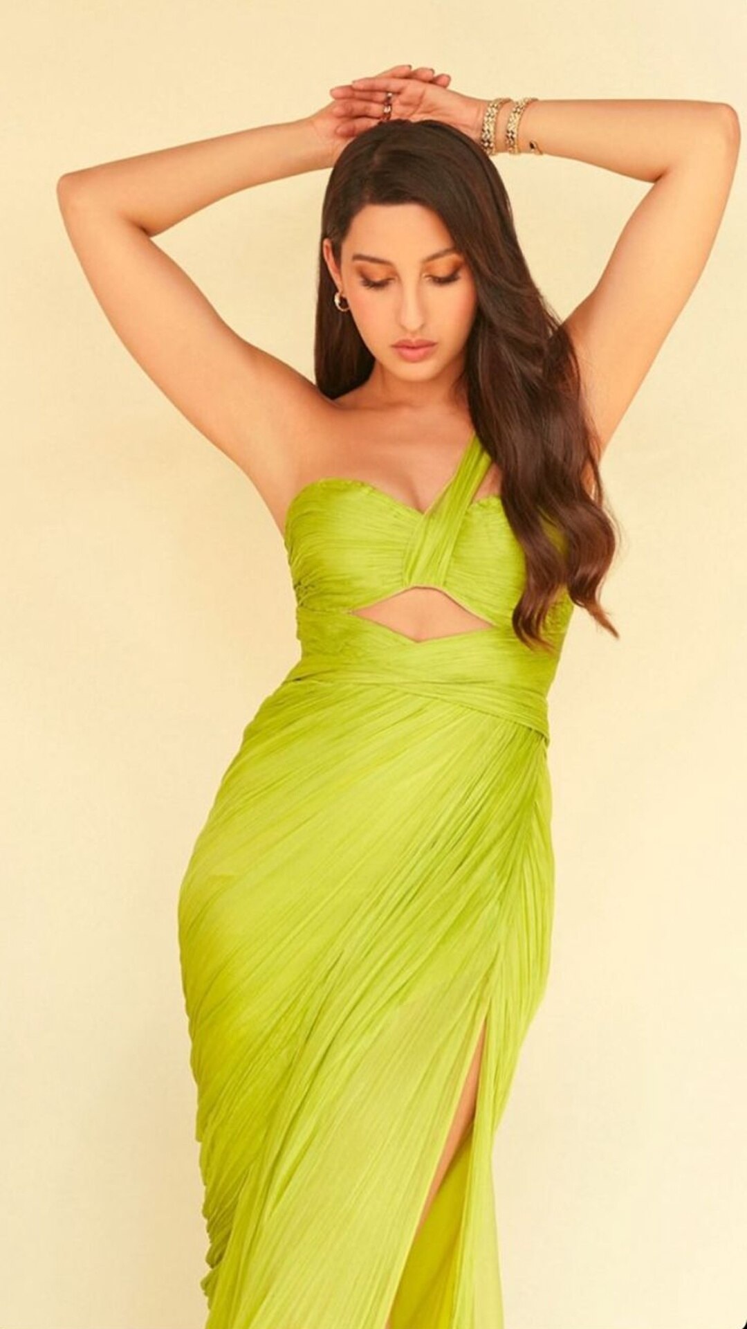 Nora Fatehi Adds Glitz And Glamour In A Shimmery Green Dress