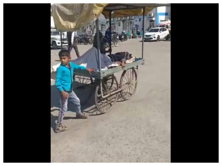 MP: Video Of Boy Carrying Ailing Man On Handcart Goes Viral, Officials Deny ‘No Ambulance’ Claim MP: Video Of Boy Carrying Ailing Man On Handcart Goes Viral, Officials Deny ‘No Ambulance’ Claim