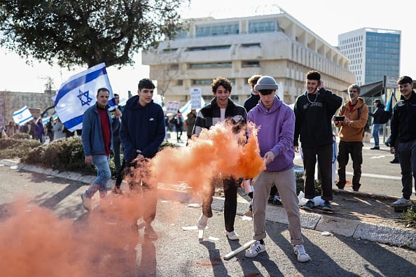 Hundreds more others protested at Jerusalem's Western Wall, the holiest site for Jewish prayer, before marching to the Knesset. (Source: Getty)