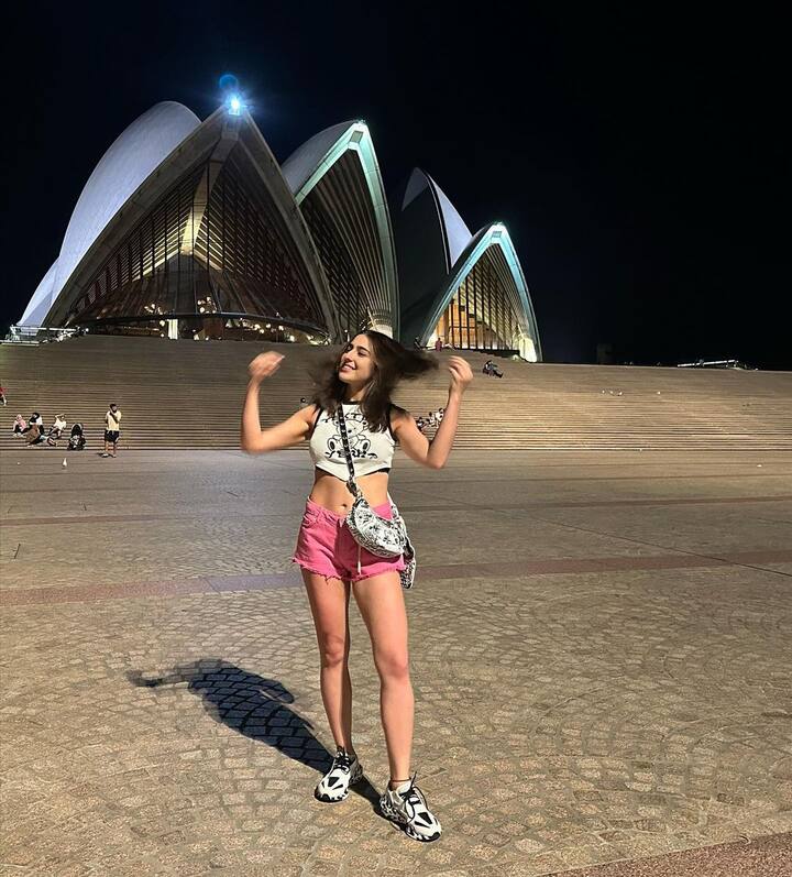 Sara Ali Khan was recently seen enjoying a vacation in Australia. She looked quirky in this white crop top and pink shorts. (Image Source: Instagram)