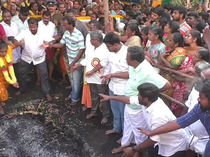 கரூர் அன்ன காமாட்சி அம்மன் 100-ம் ஆண்டு பூக்குழி திருவிழா - திரளான பக்தர்கள் பங்கேற்பு