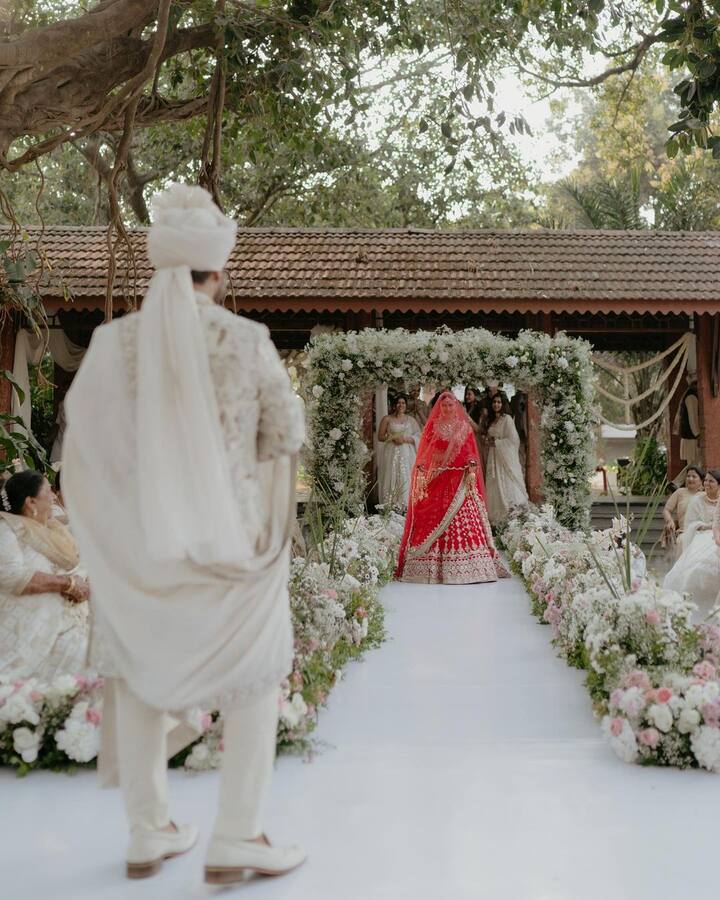 While Abhishek was dressed in an ivory kurta pyjama set with a matching safa, Shivaleeka looked gorgeous in a bright red lehenga. (Image Source: Instagram)